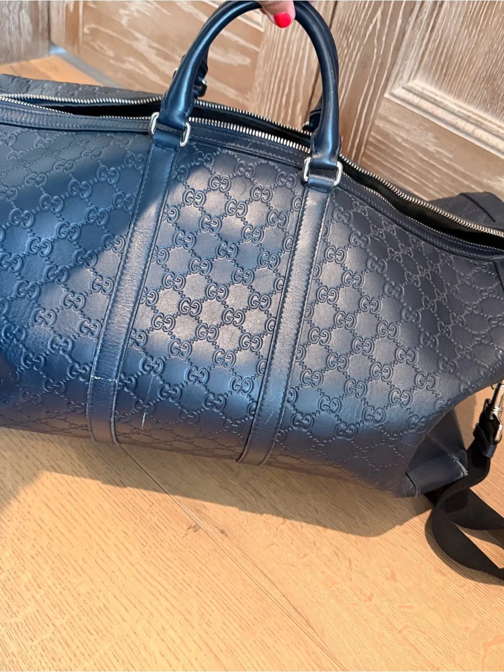 Gucci Navy Embossed GG Leather Duffel Bag